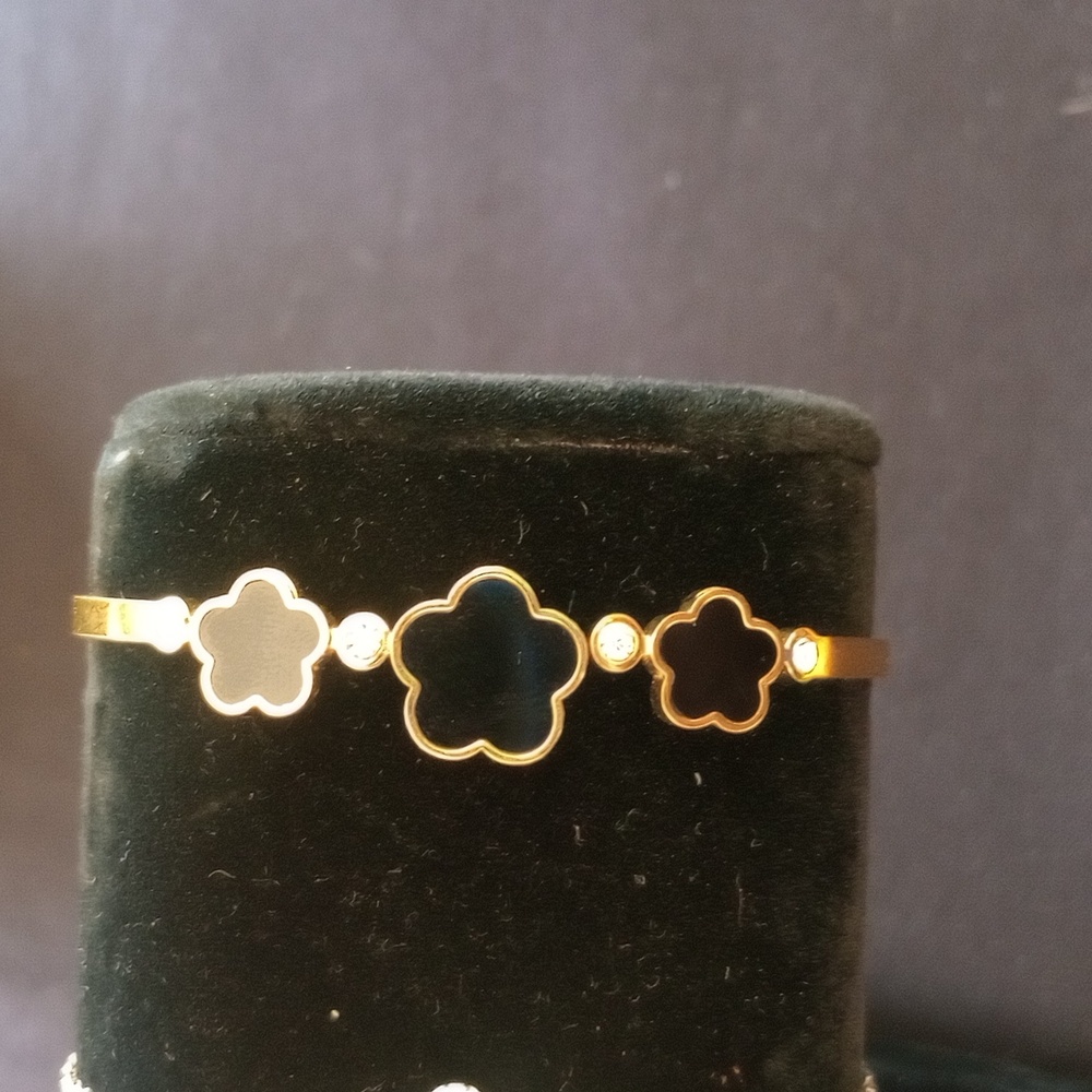 Gold and black bracelet